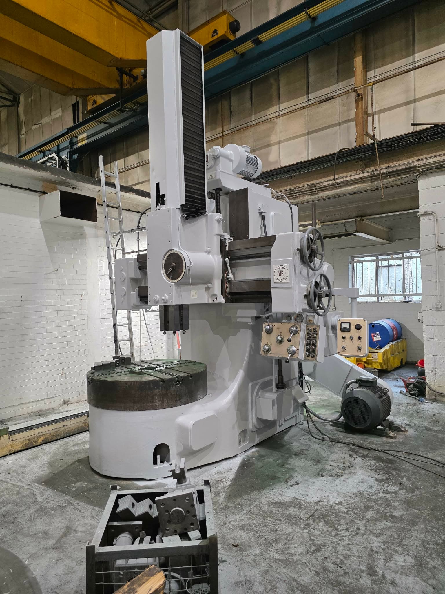 The same Webster & Bennett vertical boring machine resprayed light grey, with the worktable left as bare metal